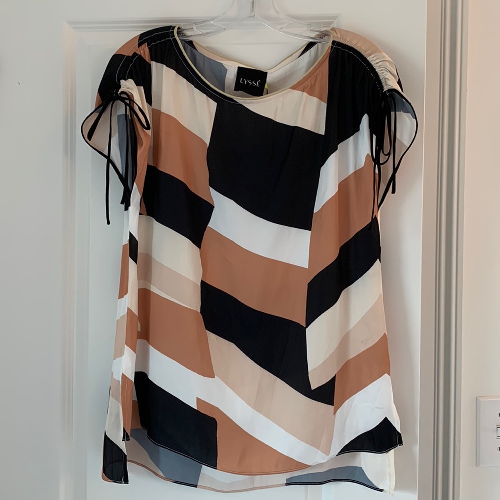 Cute sleeveless top with tie details at the shoulder